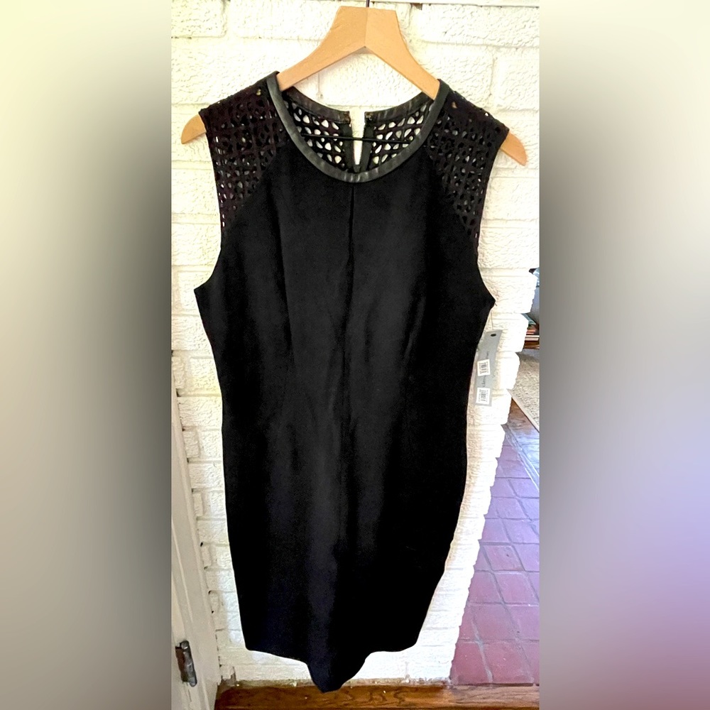 Black cocktail dress with lattice detail